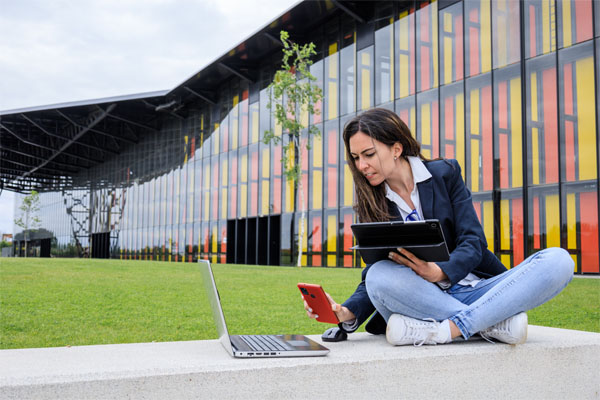 girl using a couple different devices